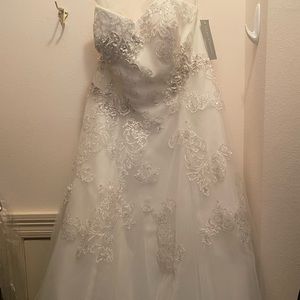 Vintage style Oleg Cassini tea length embroidered wedding dress with halter.